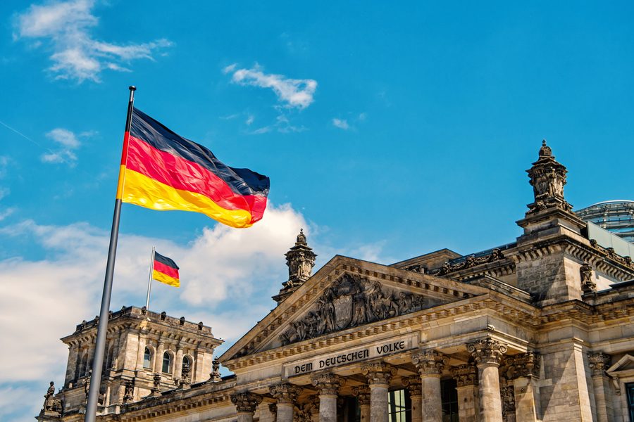 German flag in front of the Reichstag building, Berlin